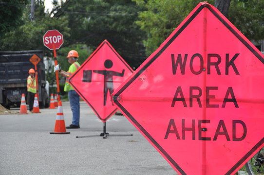 Flagger - Road Work Ahead Image